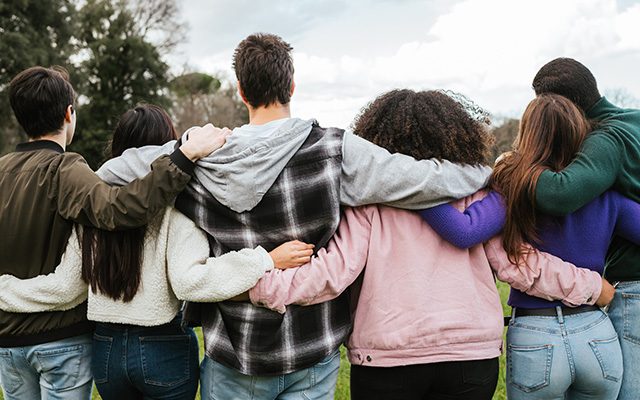 foster teenagers group activity hugging