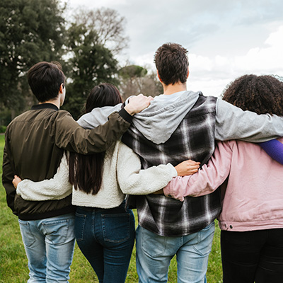 foster teenagers group activity hugging