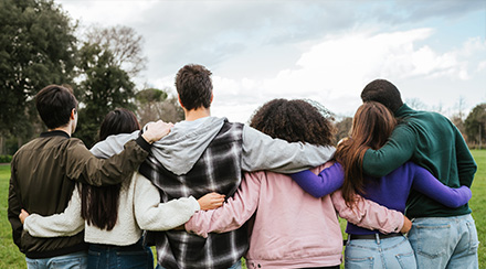 foster teenagers group activity hugging