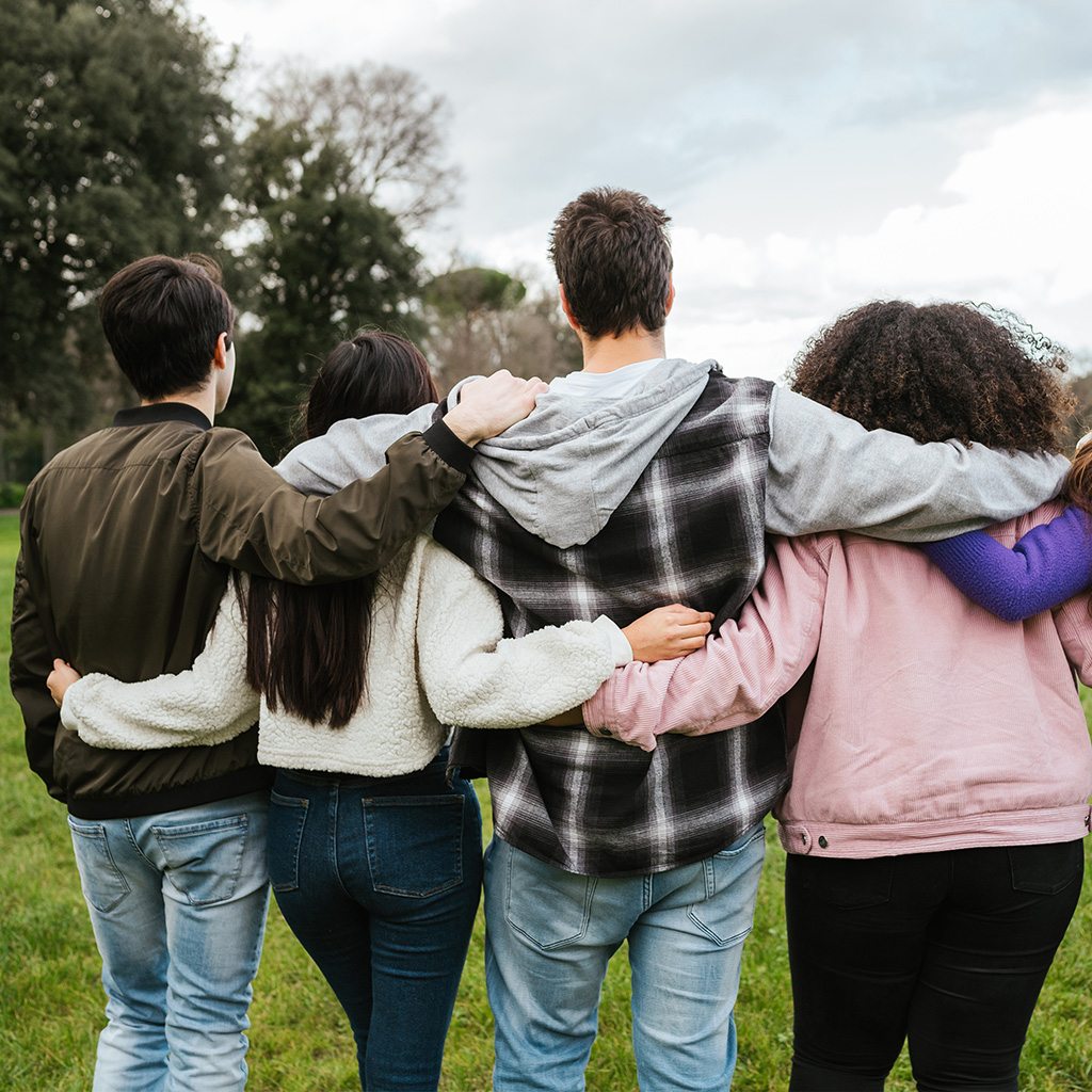 foster teenagers group activity hugging