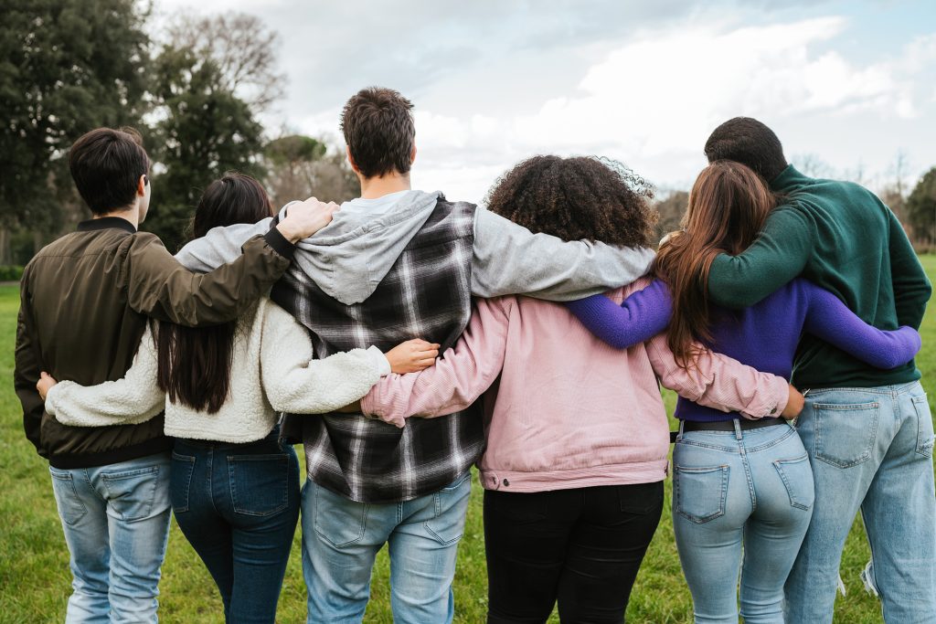 foster teenagers group activity hugging
