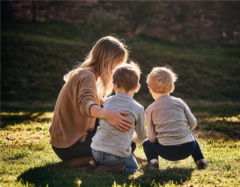 Mother playing with two boys
